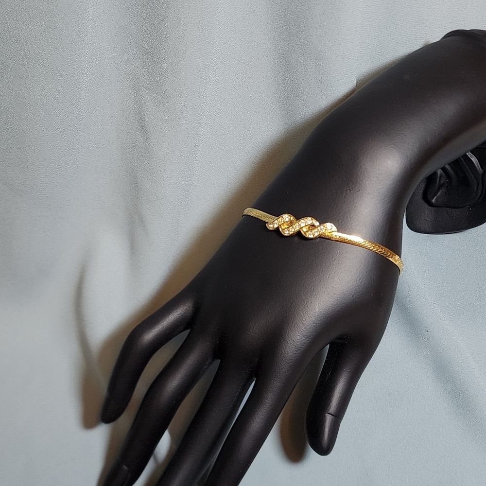 Vintage Avon Gold-Tone Snake Chain Bracelet with Rhinestone Swirl Accent 80s 90s